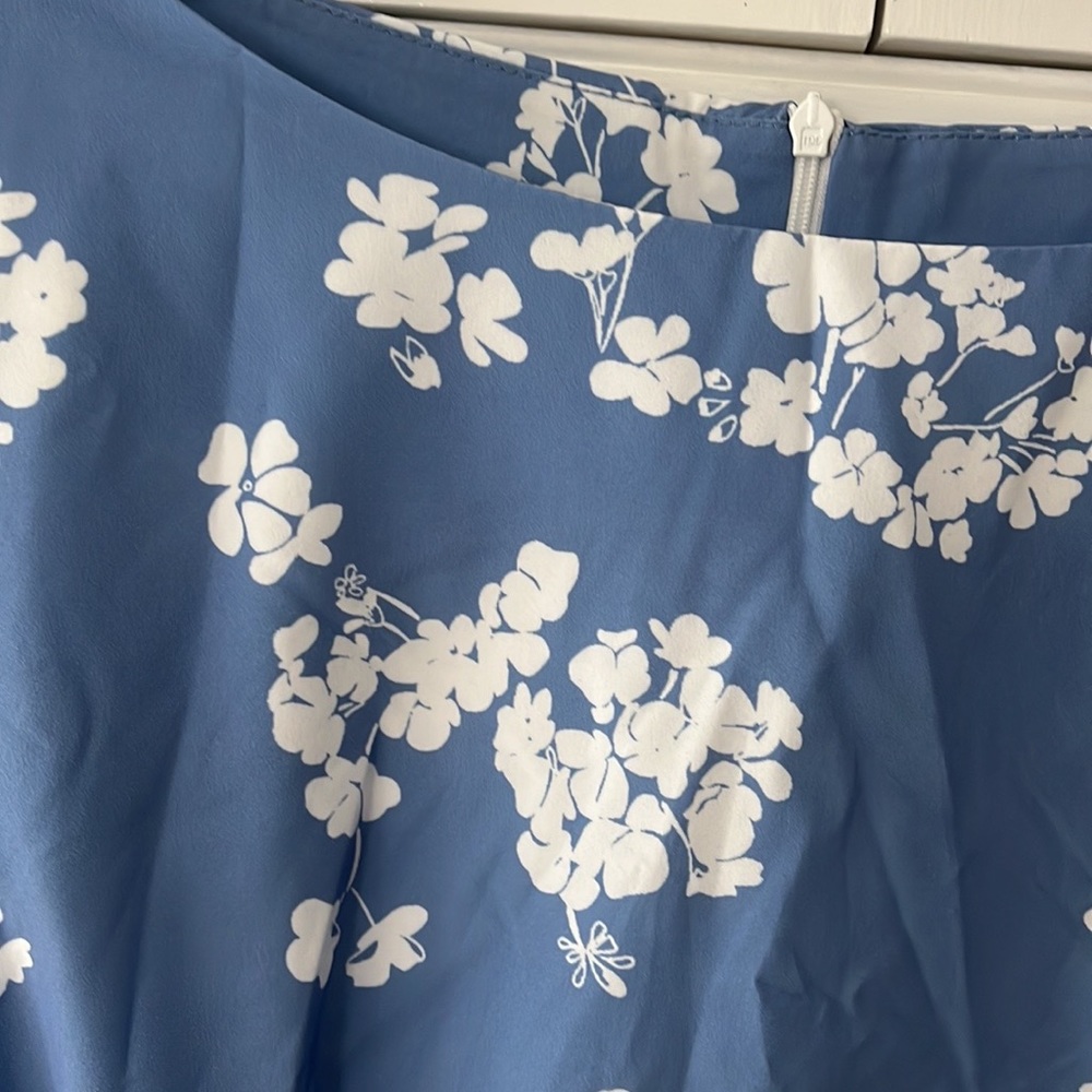 Woman’s sleeveless blue flora dress VACATION READY